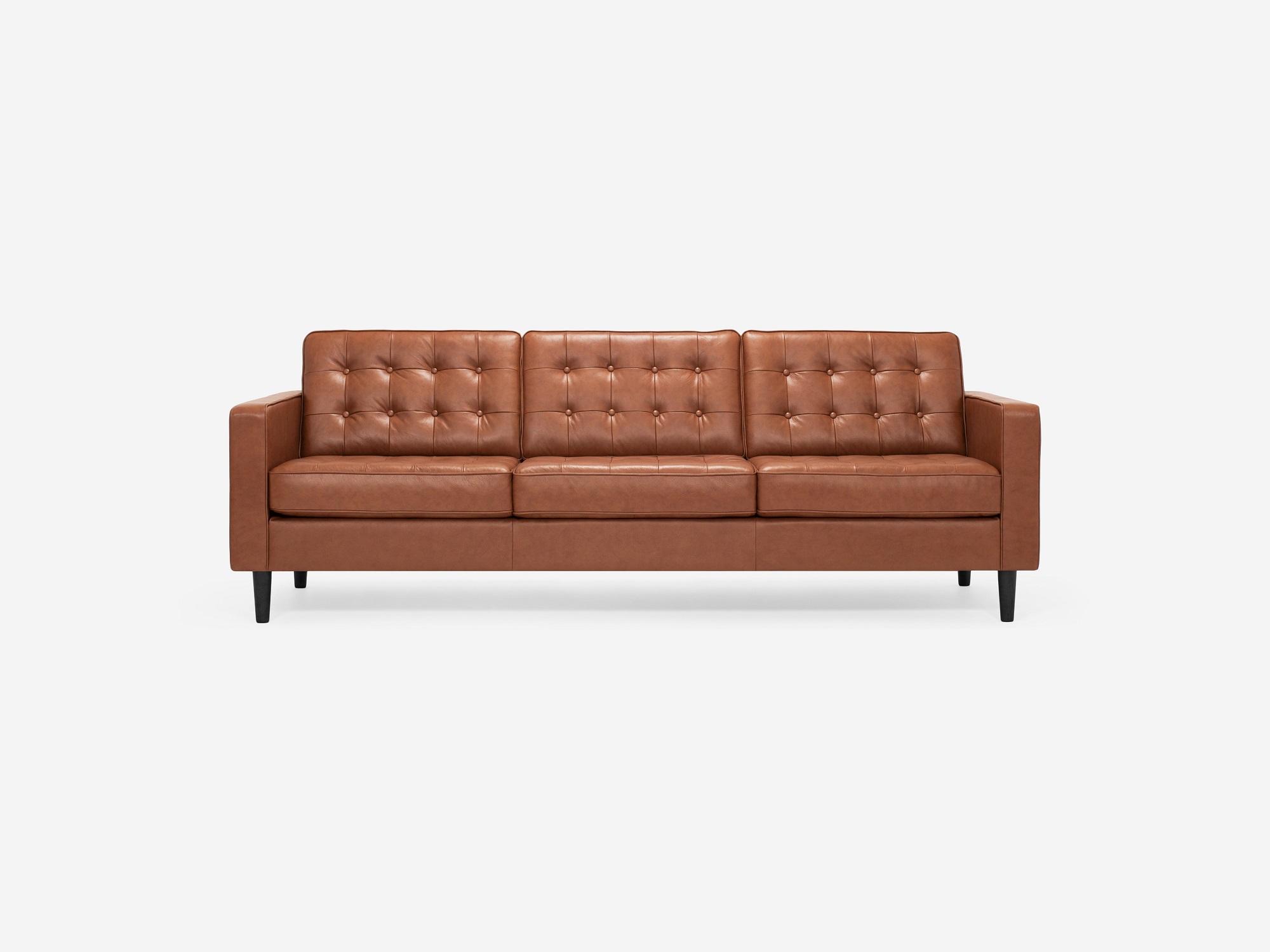 Front view of our mid century modern sofa, the Reverie 92", upholstered in red brown leather